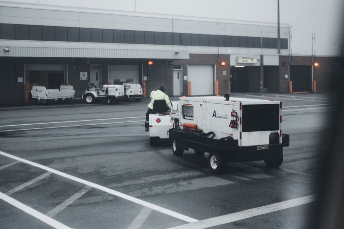 Dubai airport cargo terminal with forklifts and containers